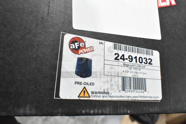 aFe Power MagnumFLOW air filter, model 24-91032, pre-oiled, in original packaging. Warning label visible.