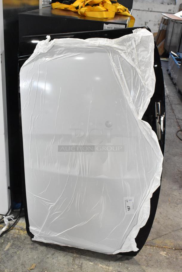 New car panel wrapped in protective white plastic, visible tag with item number 197, mint condition.