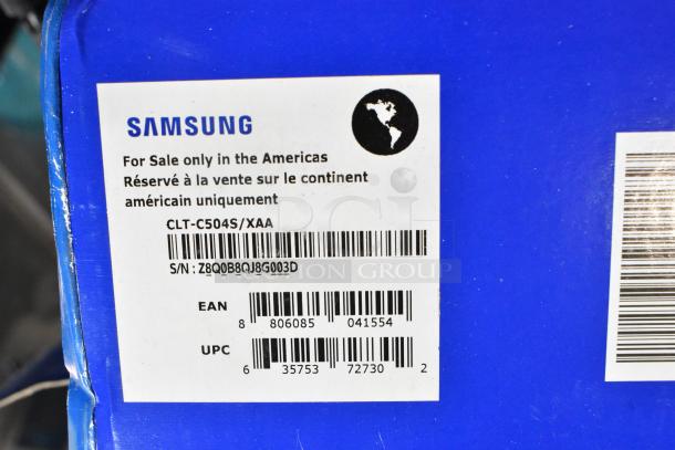 Samsung CLT-C504S/XAA toner cartridge label, including UPC and EAN codes, in a black poly bin for auction.
