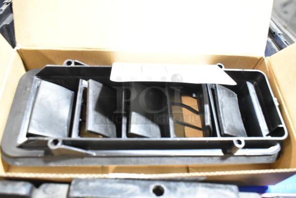 Black poly bin containing Samsung CLT-C504S/XAA toner cartridges, shown partially opened, with visible black components.