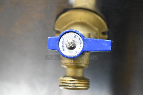 The image shows a blue Nibco valve with a brass fitting, designed for a quarter-turn operation, featuring indicator markings.