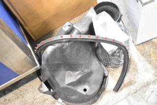 SLP Blackwing Cold Air Induction Kit, black components, includes tubing and intake housing, appears unused.
