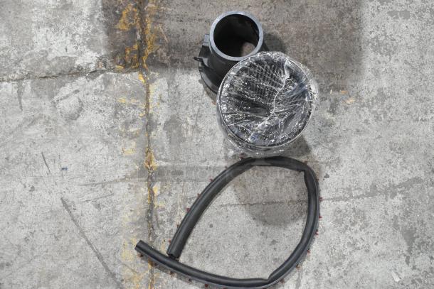 SLP Blackwing Cold Air Induction Kit, wrapped, includes intake tube and filter. Appears new, suitable for performance upgrade.