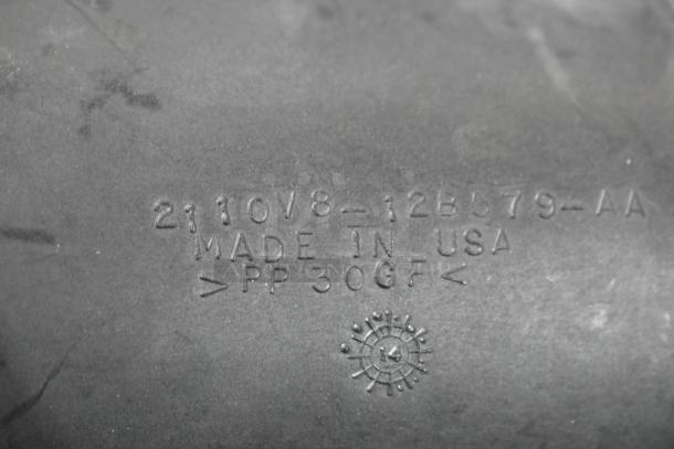 Close-up of SLP Blackwing Cold Air Induction Kit showing markings: "2110V8-12B579-AA", "MADE IN USA", ">PP 30GF<".