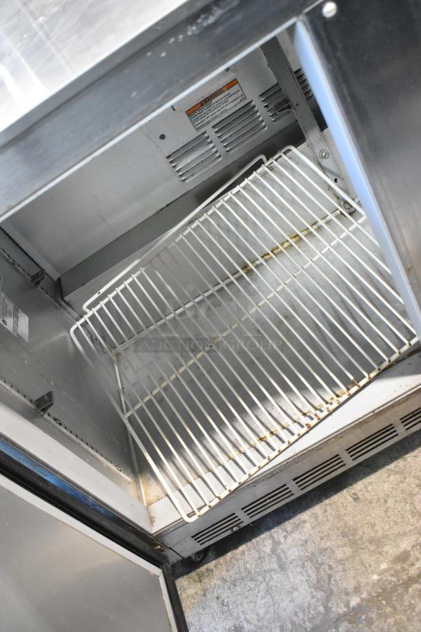 Beverage Air UCR48A stainless steel commercial 2-door undercounter cooler, 115 volts, 1 phase, interior view, used condition.