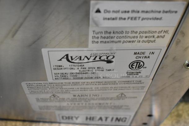 BRAND NEW 2024 Avantco 177STE4SA stainless steel 4-bay steam table, electric, 120V, 1 phase, scratch and dent. Labels show specs.