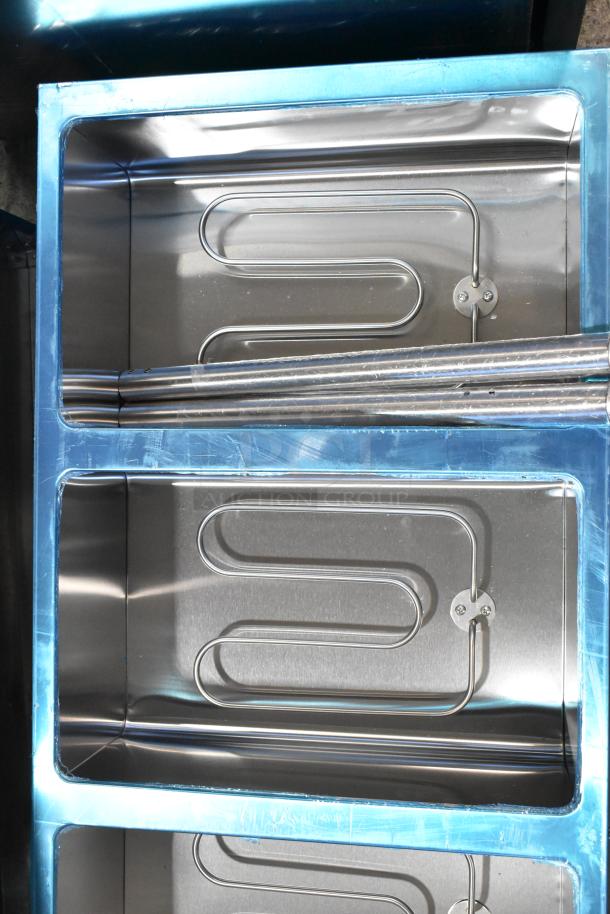 BRAND NEW 2024 Avantco 177STE4SA stainless steel steam table, 4 bays, electric powered, 120V, some visible scratches.