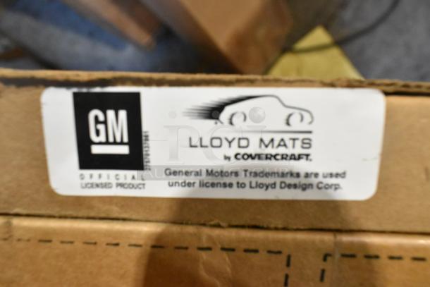 Box with GM official licensed product label for Lloyd Mats by Covercraft, indicating use under license to Lloyd Design Corp.