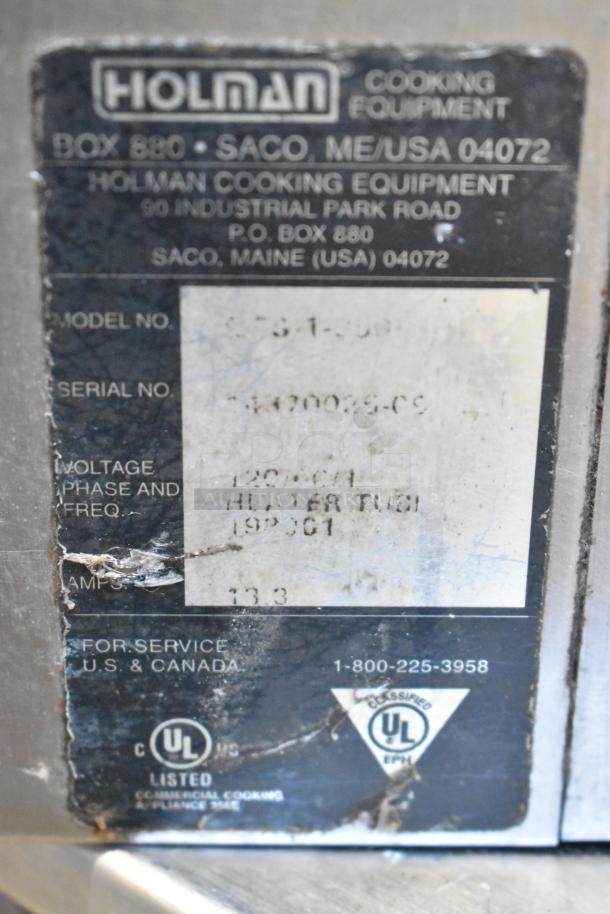 Holman stainless steel commercial conveyor toaster oven label, showing specifications including 208 volts, 1 phase.