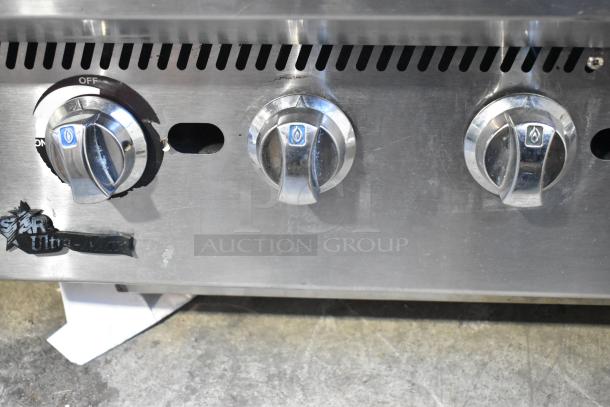Star Stainless Steel Commercial Countertop Charbroiler Grill knobs, featuring durable construction and visible logo.