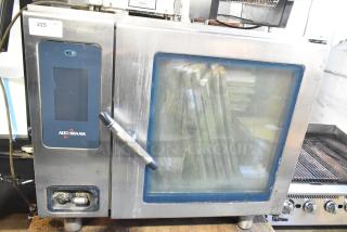 Alto Shaam CTP7-20E stainless steel commercial combi convection oven, 208-240V, 3 phase. Visible wear. Model tag included.