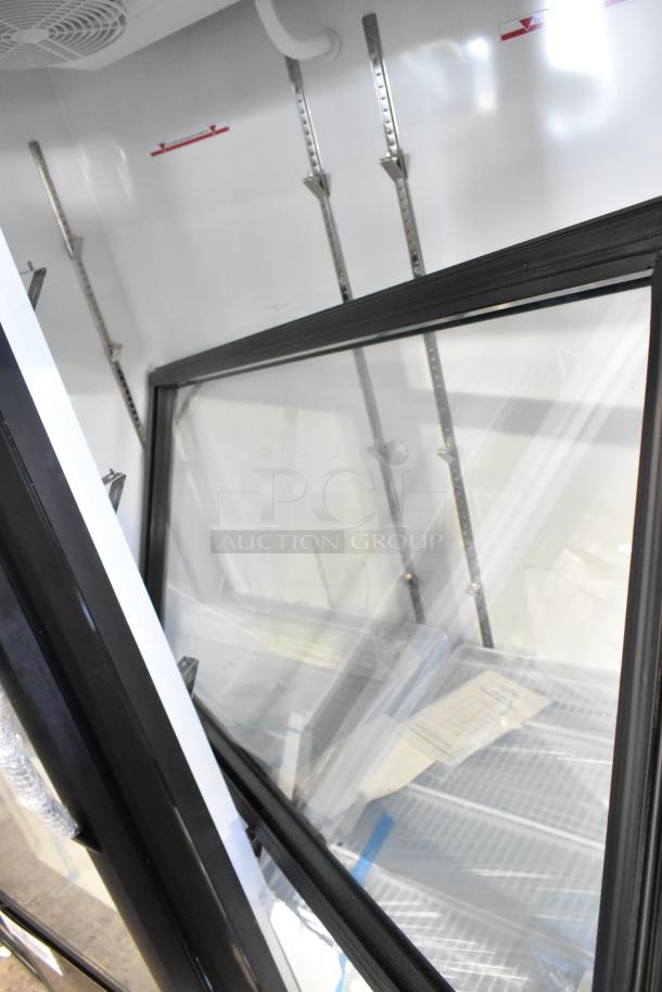 Mainstreet 829GMC49B metal 2-door reach-in cooler, commercial casters, 115V, 1-phase, interior view with doors open.