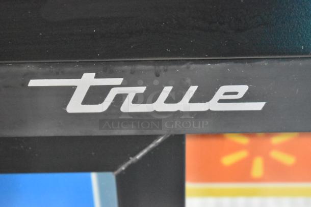 True Metal Commercial 2 Door Reach-In Cooler Merchandiser, 115V, 1 Phase, Poly Coated Racks, logo detail shown.