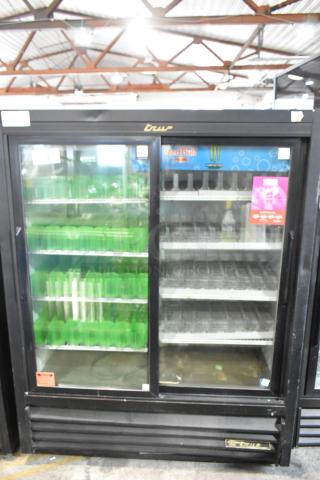 True GDM-41SL-60-LD commercial 2-door cooler with glass doors, poly-coated racks. 115V, 1 phase. Used, good condition.