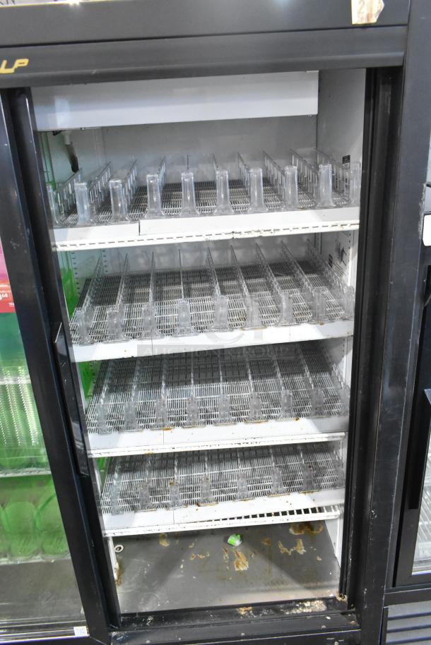 True GDM-41SL-60-LD commercial cooler, 2 glass doors, poly-coated racks, shelf dividers, used condition, 115V, 1 phase.