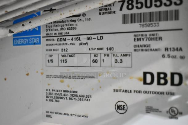 True GDM-41SL-60-LD cooler label showing model, voltage 115V, 1 phase, R134A refrigerant, NSF and Energy Star certified.