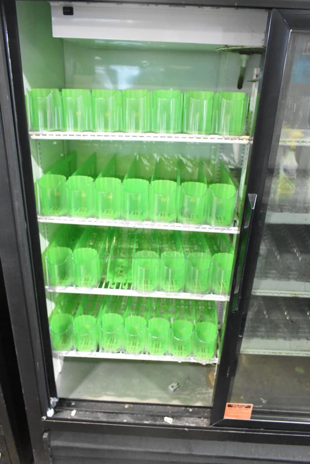 True GDM-41SL-60-LD 2 Door Commercial Cooler, metal, poly coated racks, 115V, used condition.