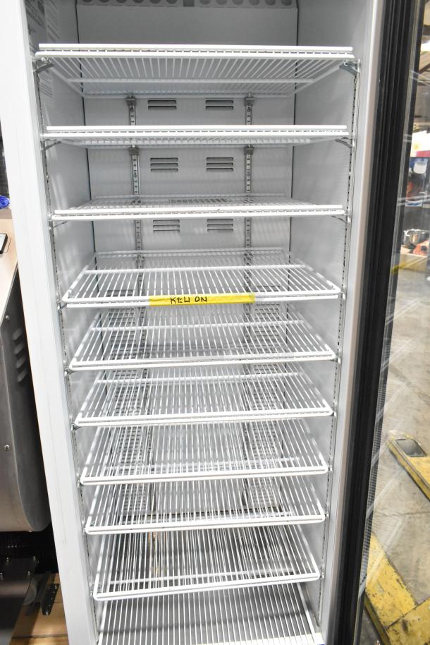 2019 Habco SE18 metal commercial single door reach-in cooler with poly-coated racks, 115 volts, 1 phase, excellent condition.