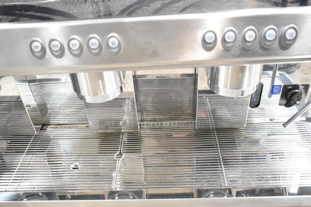 BRAND NEW Estella ECEM3/N3 stainless steel 3-group automatic espresso machine, minor scratches, 220-240V, 1 phase.