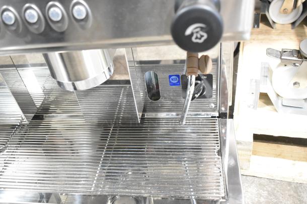 Brand new Estella ECEM3/N3 stainless steel commercial espresso machine, 3 group, NSF labeled, 220-240V, minor scratches.
