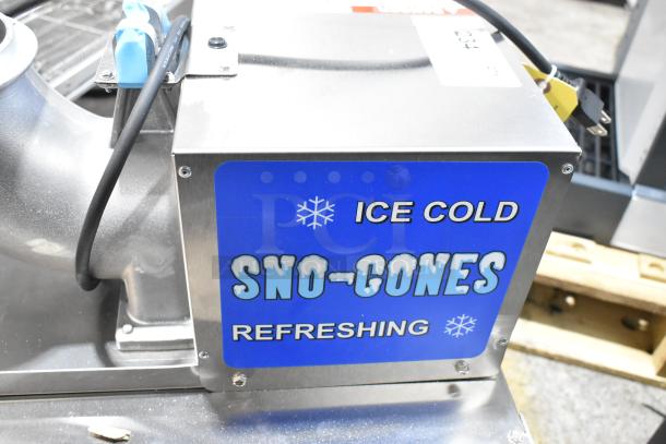 BRAND NEW Paragon 6133300 Snow Cone Machine. Metal countertop model with scratch and dent. 120V, 1 Phase.