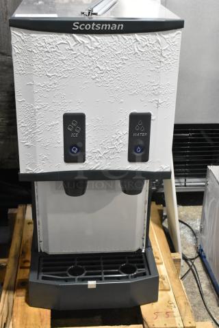 BRAND NEW SCRATCH AND DENT! 2025 Scotsman HID312ABX-1A Stainless Steel Commercial Countertop Nugget Ice Machine and Water Dispenser with Push Button Dispensing - 12 lb. Bin Capacity. 115 volts, 1 Phase. - Item #1215962