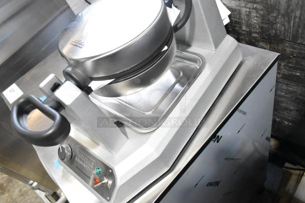 Brand new 2024 Waring WWD180X single waffle maker, 120 volts, slight scratch and dent. Control dial, indicator lights visible.