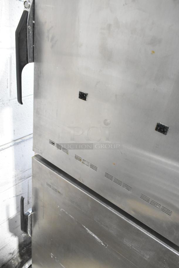 Alto Shaam 1200-UP stainless steel holding cabinet, 16-pan capacity, Dutch door, on commercial casters, 120V, 1 phase.