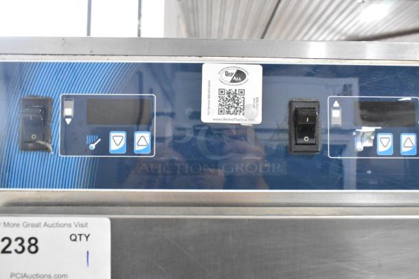 Alto Shaam 1200-UP stainless steel holding cabinet control panel with digital display and switches, mounted on casters.