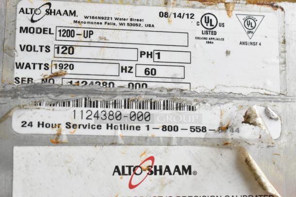 Alto Shaam 1200-UP label showing model, voltage, and serial number details; 120 volts, 1 phase, commercial use.