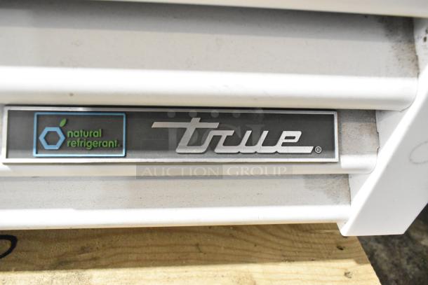 True TSCI-600R-G-PH cooler label, highlighting natural refrigerant feature; metal commercial single door reach-in model, 115V.