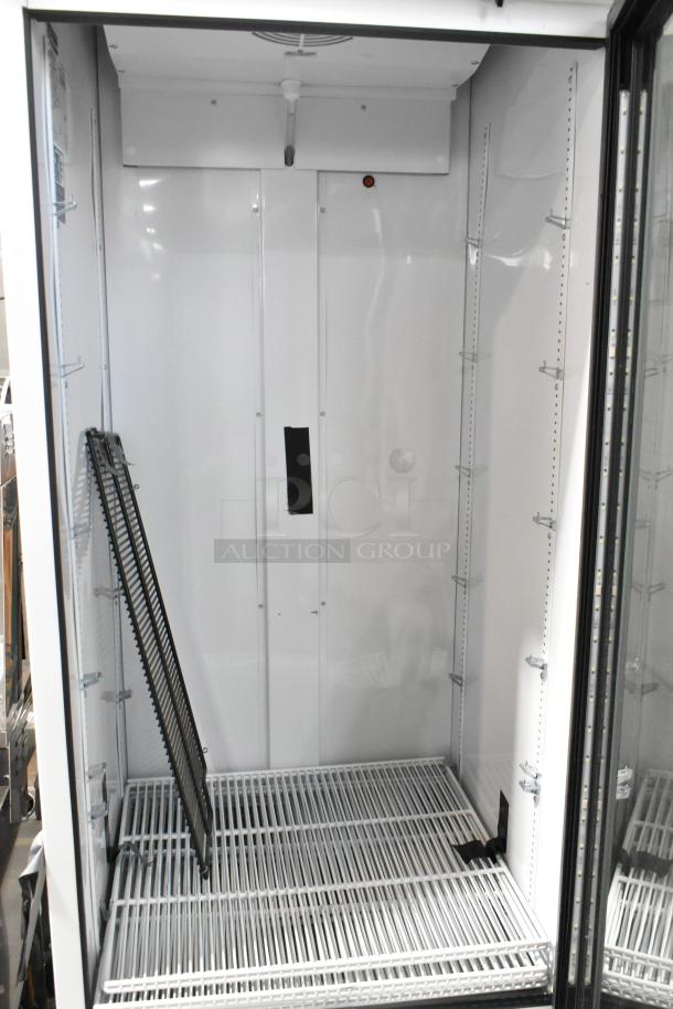2021 True TSCI-600R-G-PH metal commercial single door cooler, poly coated racks, 115V, excellent condition.