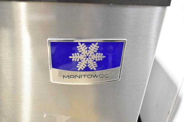 Stainless steel Manitowoc IYT0750A-261 ice machine, Indigo NXT, 30", half-dice, brand new with scratches, label visible.