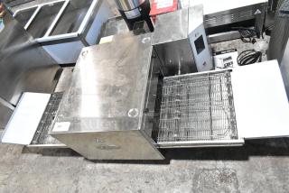 Brand new Cooking Performance Group 351ICOED stainless steel conveyor pizza oven, electric, 240V, 1 phase, scratch and dent.