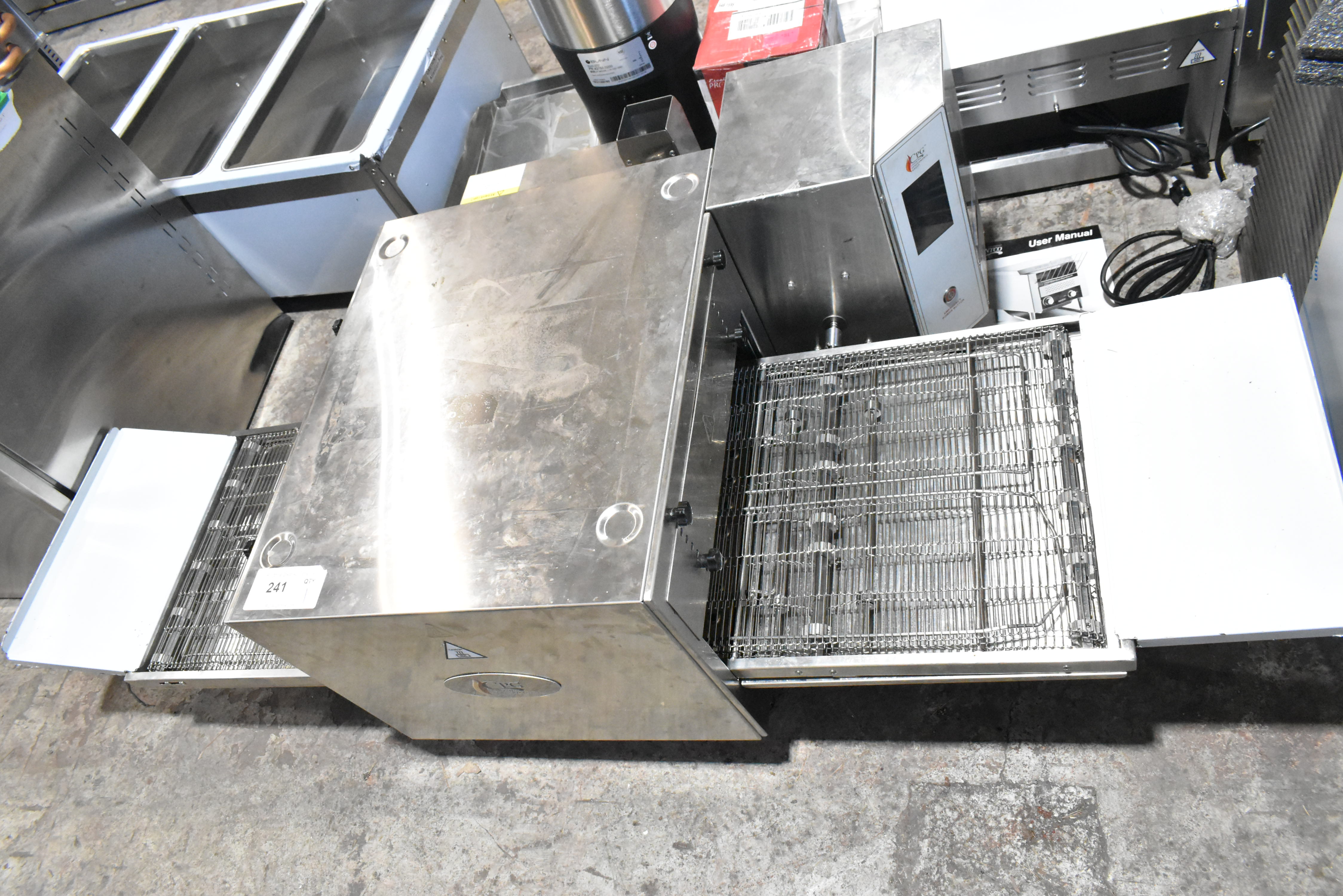 Brand new scratch and dent CPG conveyor pizza oven showing cosmetic damage