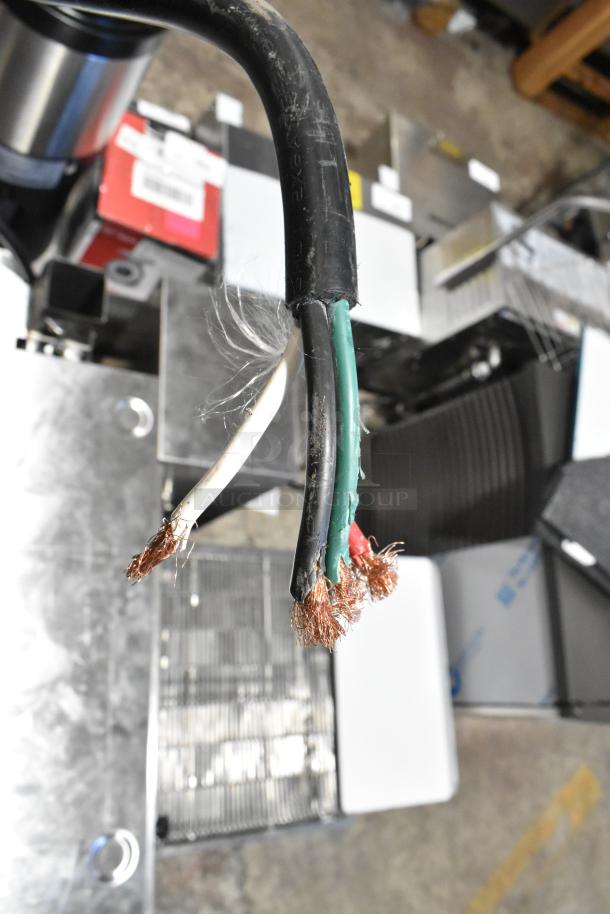 Damaged wiring of a Cooking Performance Group CPG 351ICOED conveyor pizza oven, 240V, 1 Phase.