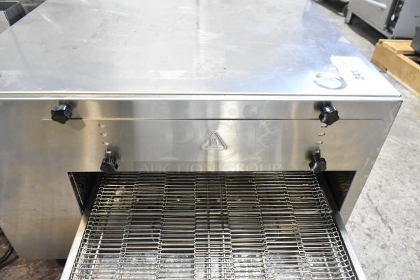 Brand new scratch and dent Cooking Performance Group 351ICOED stainless steel conveyor pizza oven, electric, 240V.