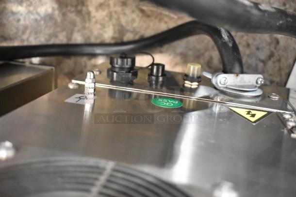 Stainless steel Cooking Performance Group 351ICOED electric conveyor pizza oven. Features power label and inspection tag.