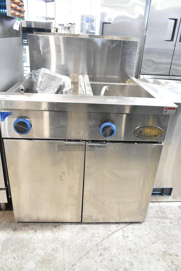 Brand new Avantco 177FPC22NL pasta cooker, stainless steel, 22-gallon, 140,000 BTU, minor dents, natural gas, two-section.