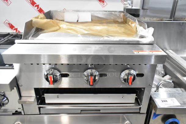 Brand new Cooking Performance Group 351S60GS24L 6-burner stainless steel range with griddle, broiler, and 2 ovens.
