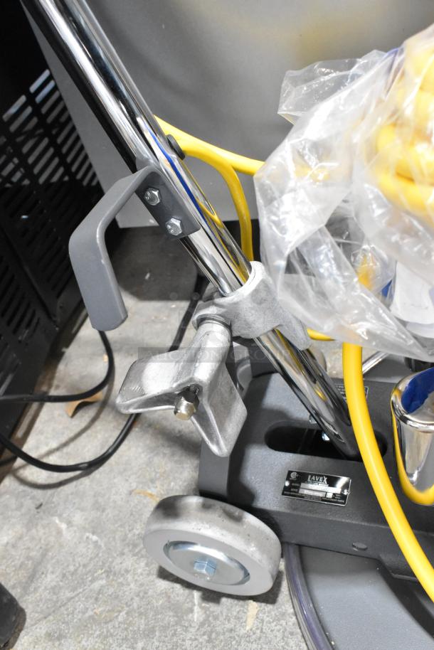Lavex TP-2015 floor cleaner, metal construction, 120V, new with minor scratches, visible label, commercial use.