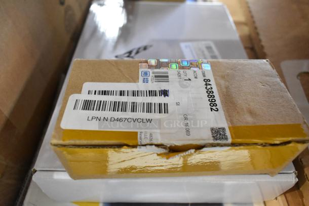 Lot of various items including GM exterior trim fender hash marks, part number 84684590. Boxes labeled with barcodes.
