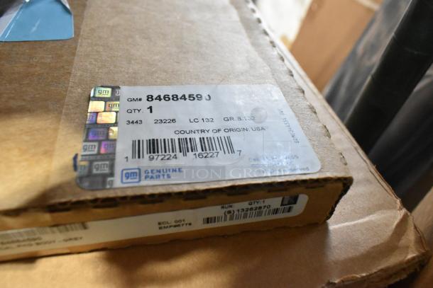Box with GM part 84684590, labeled as Genuine Parts, includes Corvette items and GM exterior trim fender hash marks.