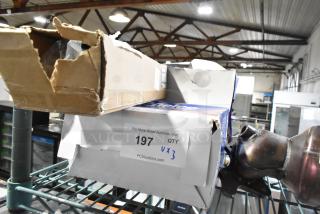 Three items including an ACDelco air filter in a damaged box, GM 84289521 mud guard, and a metal component. Auction tag: 197 UX3.