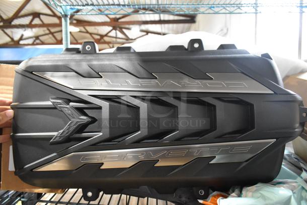 Corvette engine cover, black with silver "Corvette" and "6.2L" labels, in excellent condition.