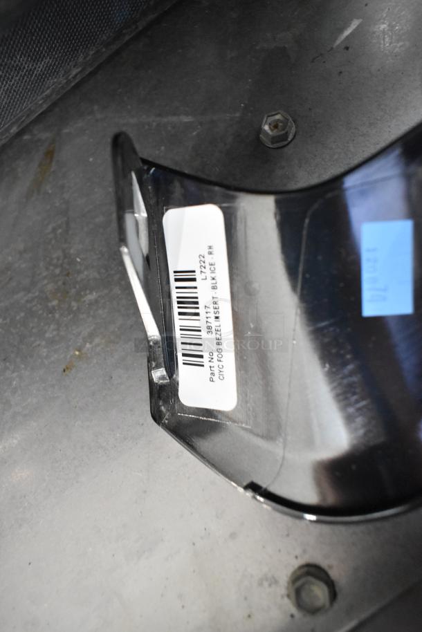 Black poly bin containing various items, tagged with "Civic Fog Bezel Insert - Black Ice, RH," part number 38711T.