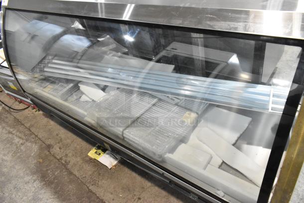 2025 Avantco 178DLC82HCB 82" black curved glass refrigerated deli case, excellent condition with visible contents inside.