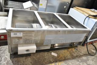 Brand new ServIt 423GST3WENG stainless steel three-pan steam table, natural gas, 10,500 BTU, minor scratches visible.