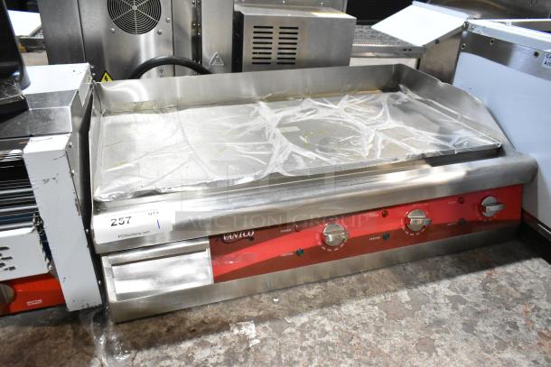 Brand new Avantco 177EG30N 30" stainless steel electric countertop griddle, 208/240V, 1 Phase, with minor scratches.