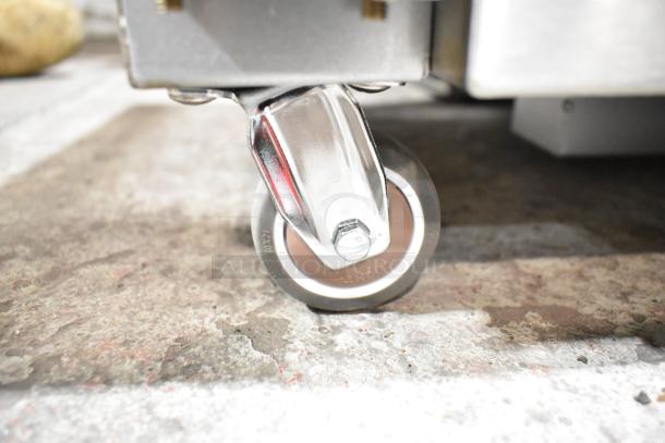 Close-up of a caster wheel on the 2025 Fryclone 259OFM55 fryer oil filter machine. Brand new condition.